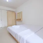 Homey And Comfort Living Studio Room At Bassura City Apartment By Travelio