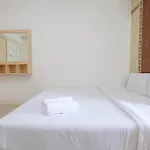 Homey And Comfort Living Studio Room At Bassura City Apartment By Travelio
