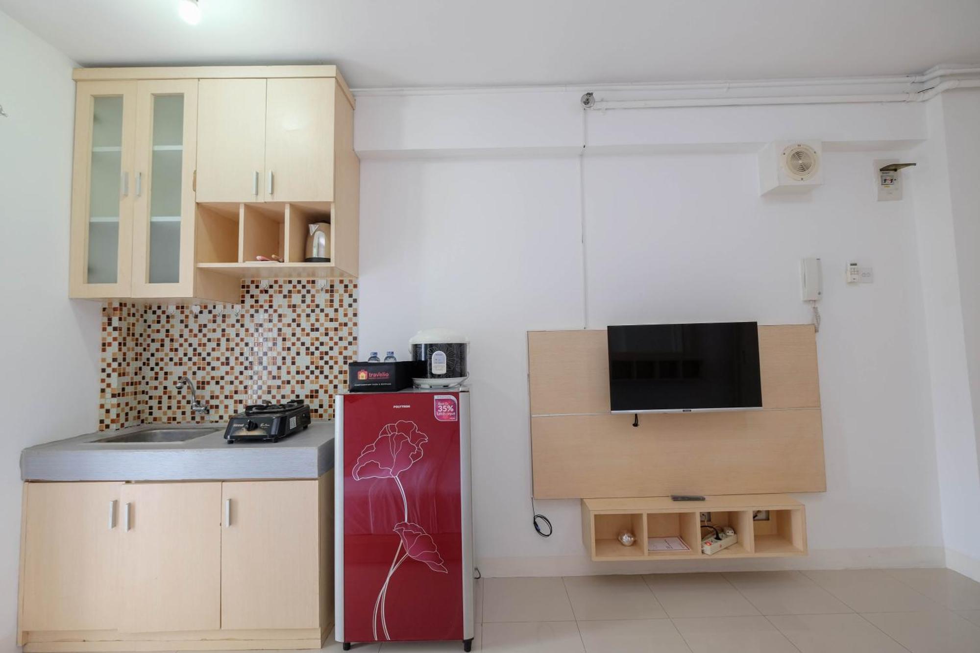 Homey And Comfort Living At Bassura By Travelio * Jakarta