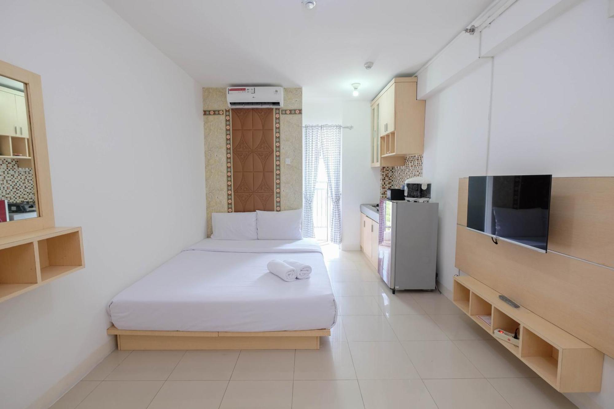 Homey And Comfort Living At Bassura By Travelio * Jakarta