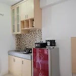 Homey And Comfort Living Studio Room At Bassura City Apartment By Travelio
